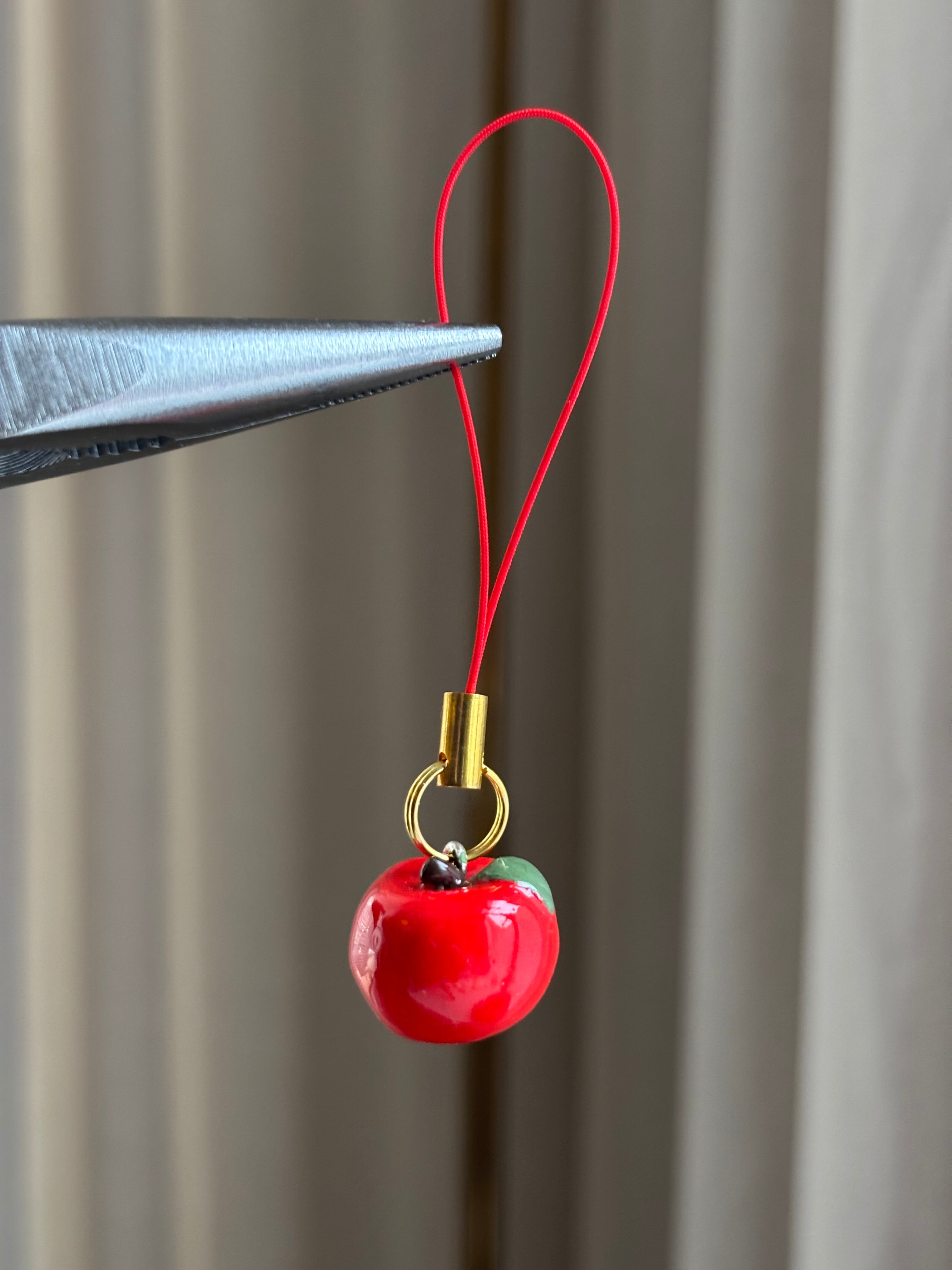 Puhelinkoru Apple S / punainen lenkki