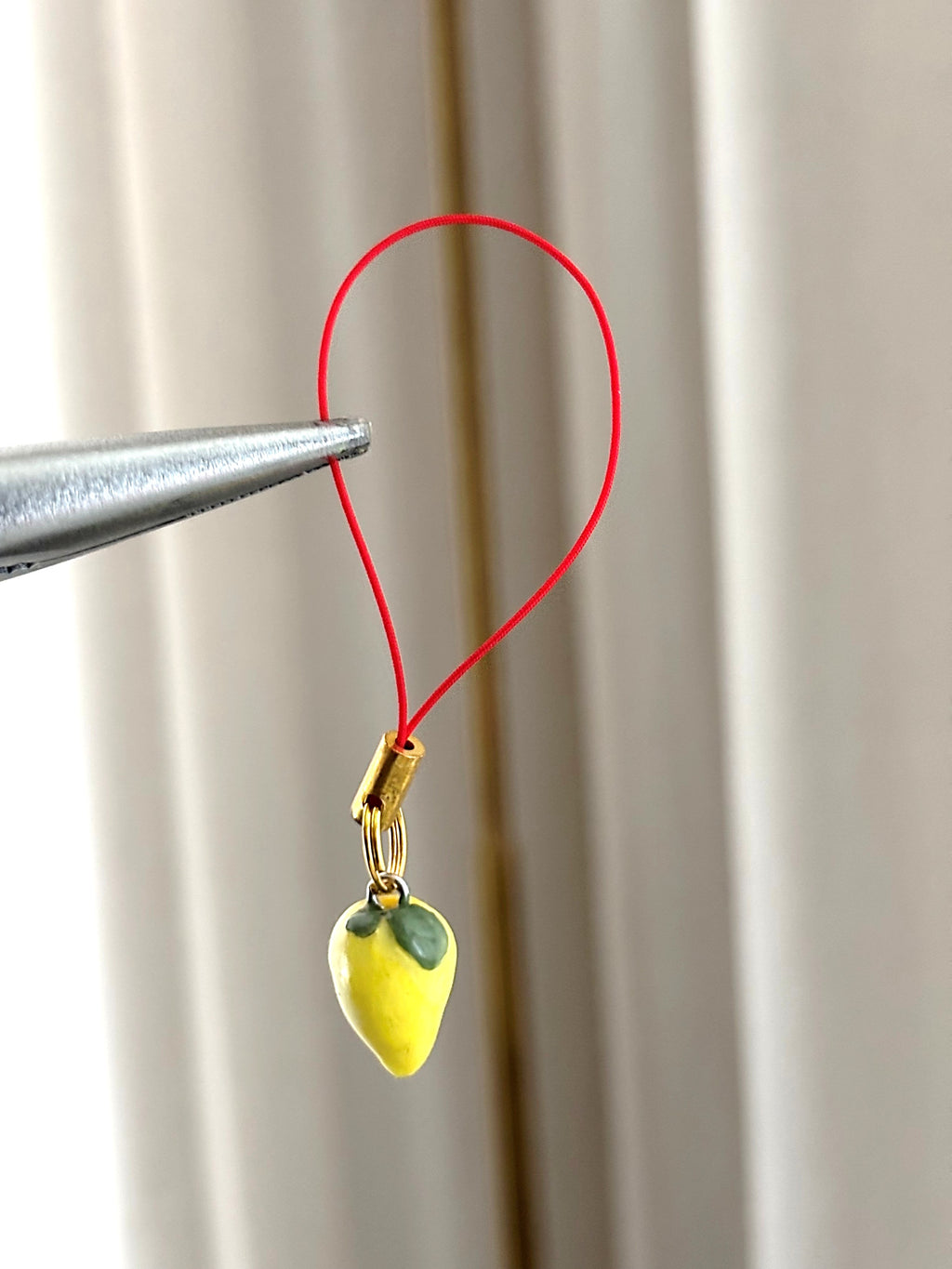 Puhelinkoru Lemon XS / punainen lenkki